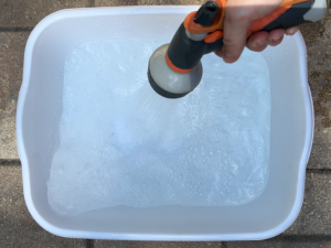 filling bucket with water