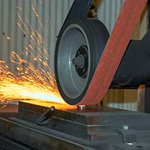 Belt grinder on metal, Winona Van Norman